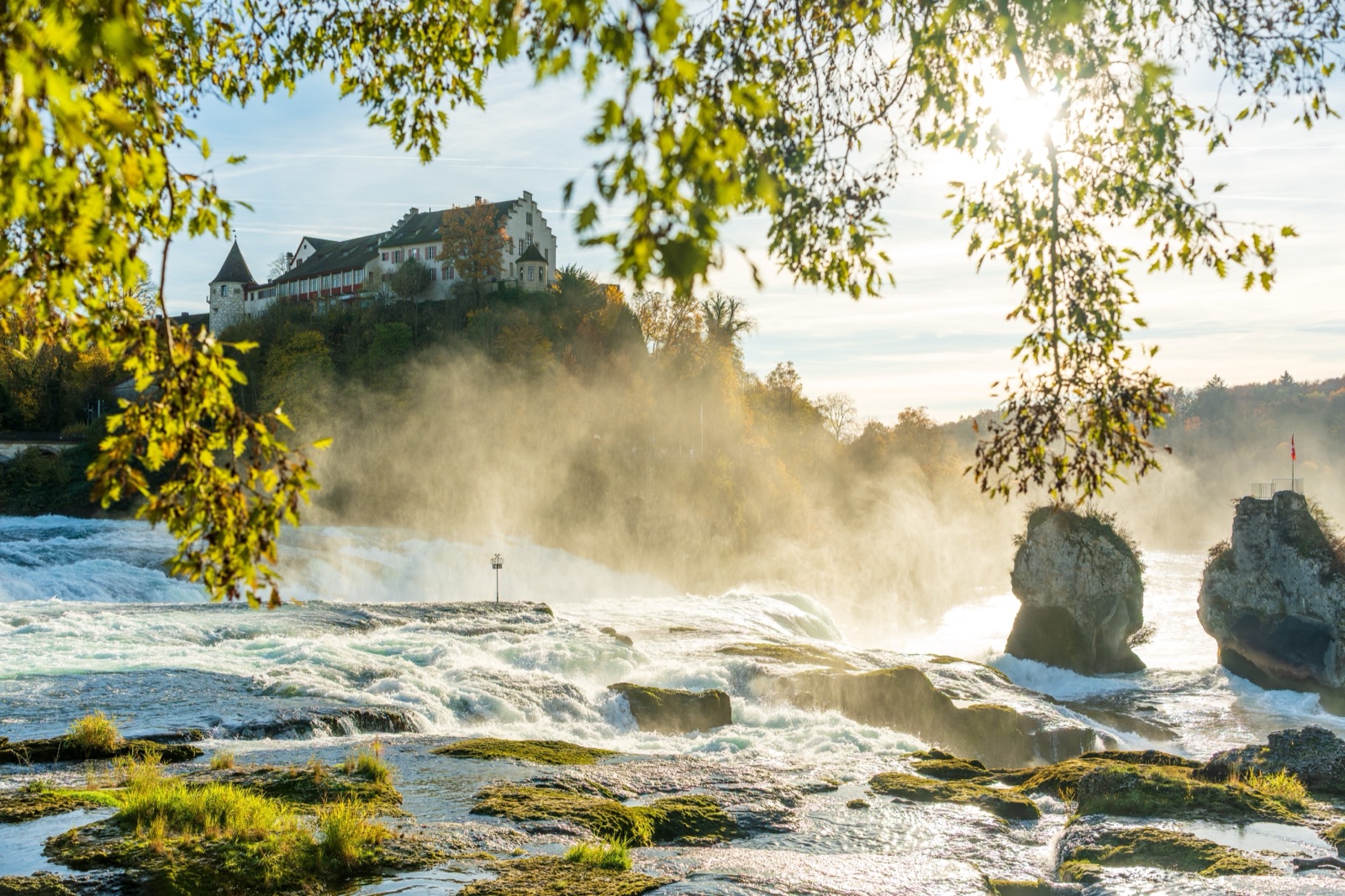 Schloss Laufen above the Rhine Falls in autumn